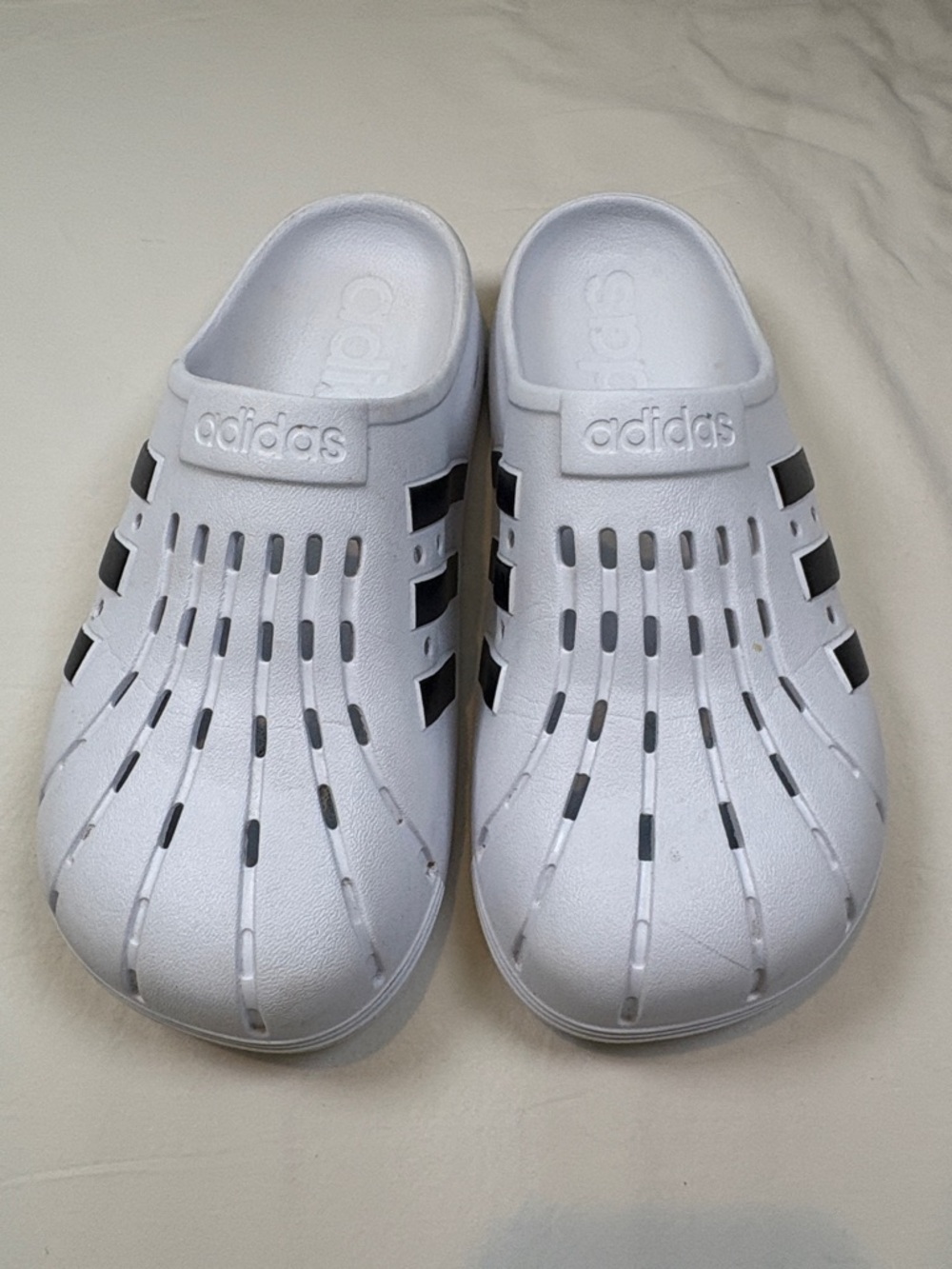 adidas men’s White Clog Sandals with Black Accents